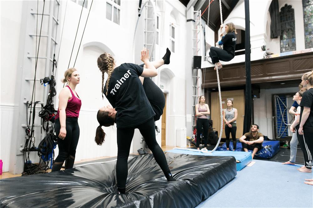 Trainers teaching aerial hoop and rope