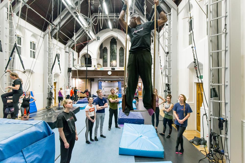 Circus teacher on a trapeze